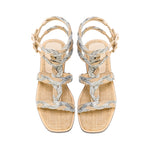 Ronda Natural Flat Gladiator Sandal with braided silver straps and natural textured sole, perfect for summer outings.