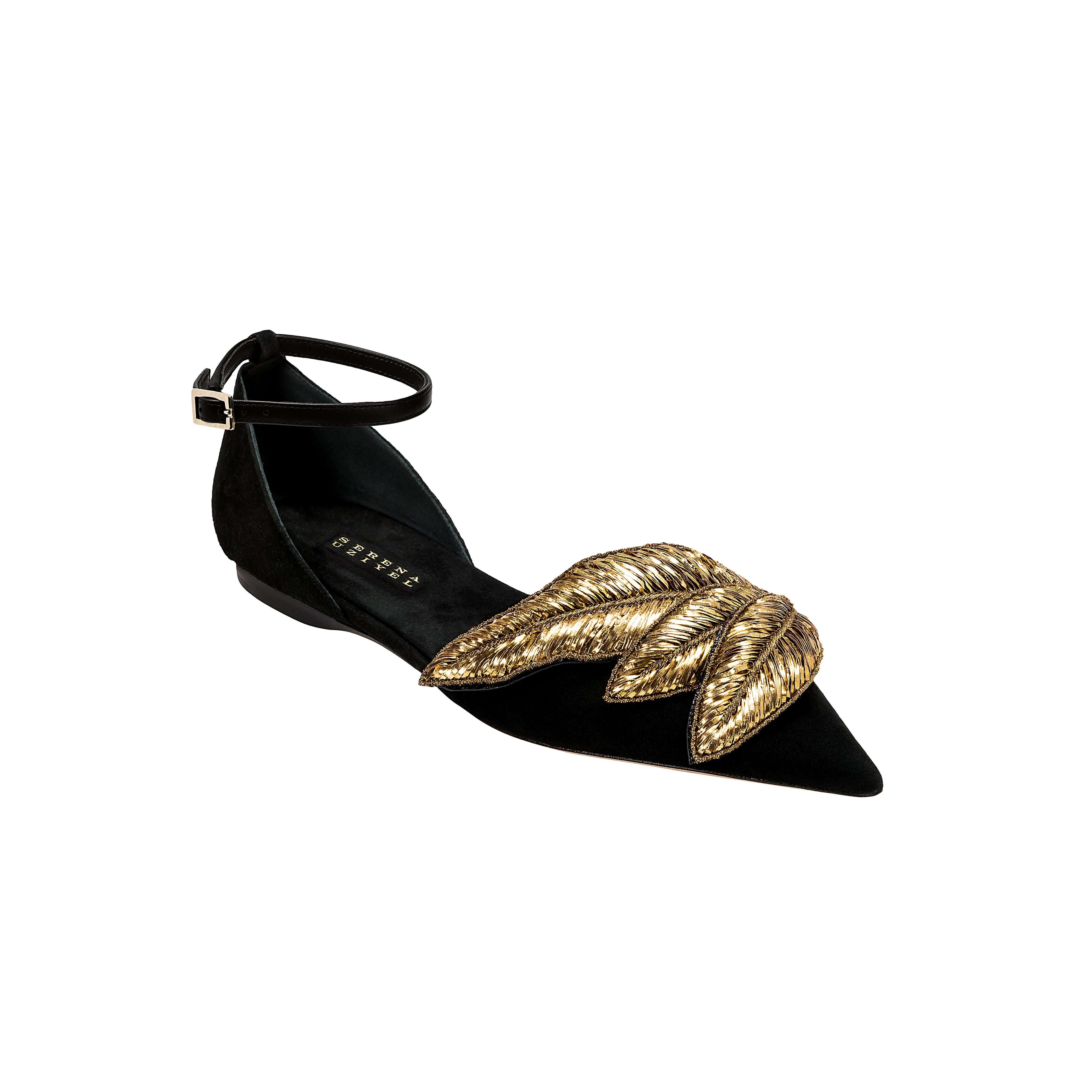 Valeria Black Flat Ankle Ballerina in suede with gold leaf embellishments for elegant comfort and sophistication.