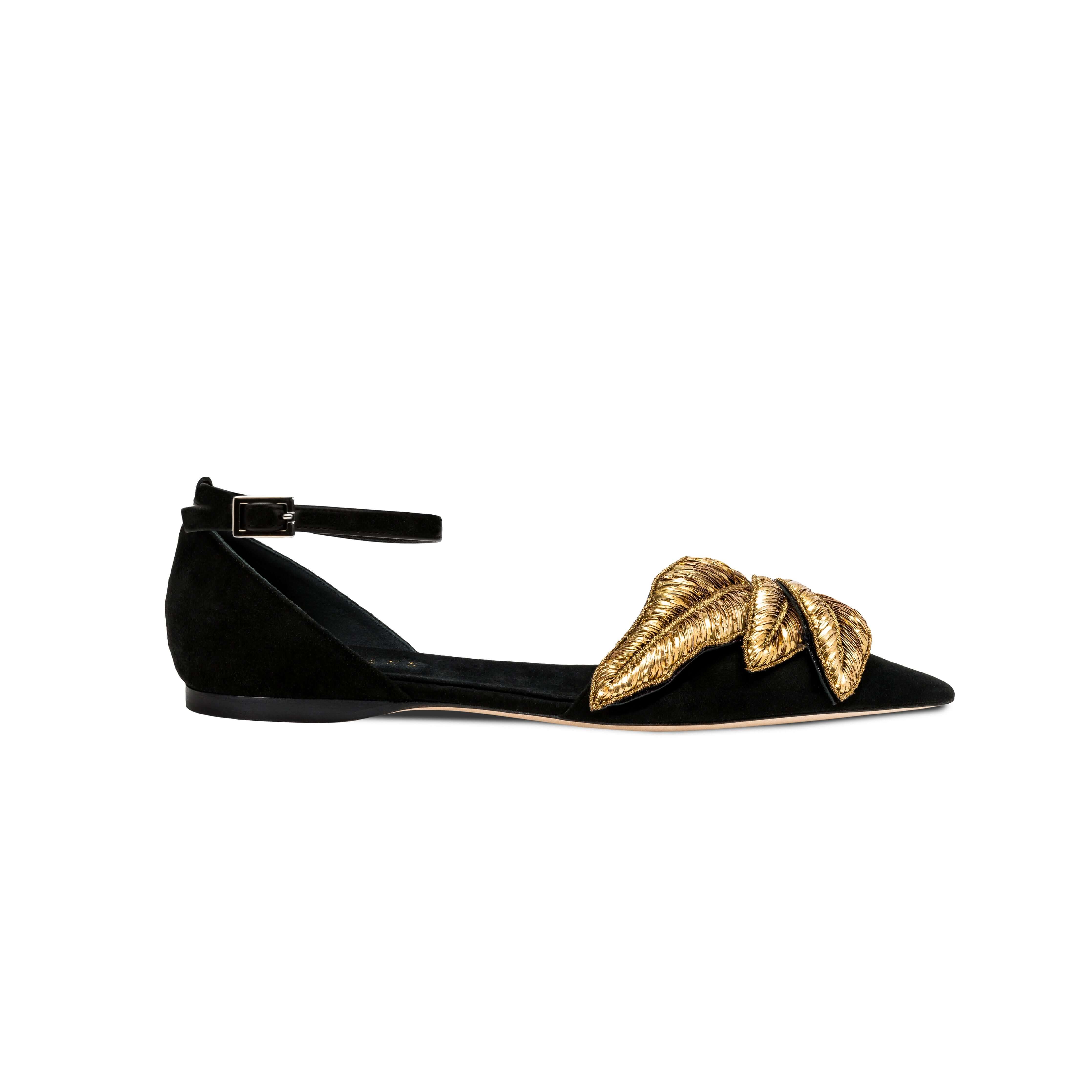 Valeria Black Flat Ankle Ballerina shoe featuring sleek suede, ankle strap, and elegant gold leaf embellishments.