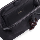 Inside view of the Petra Black Pouch Bag, featuring a suede leather interior and stylish detail.