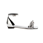 Catena mirror flat ankle sandal featuring a stylish design with metallic finish, perfect for trendy summer outfits.