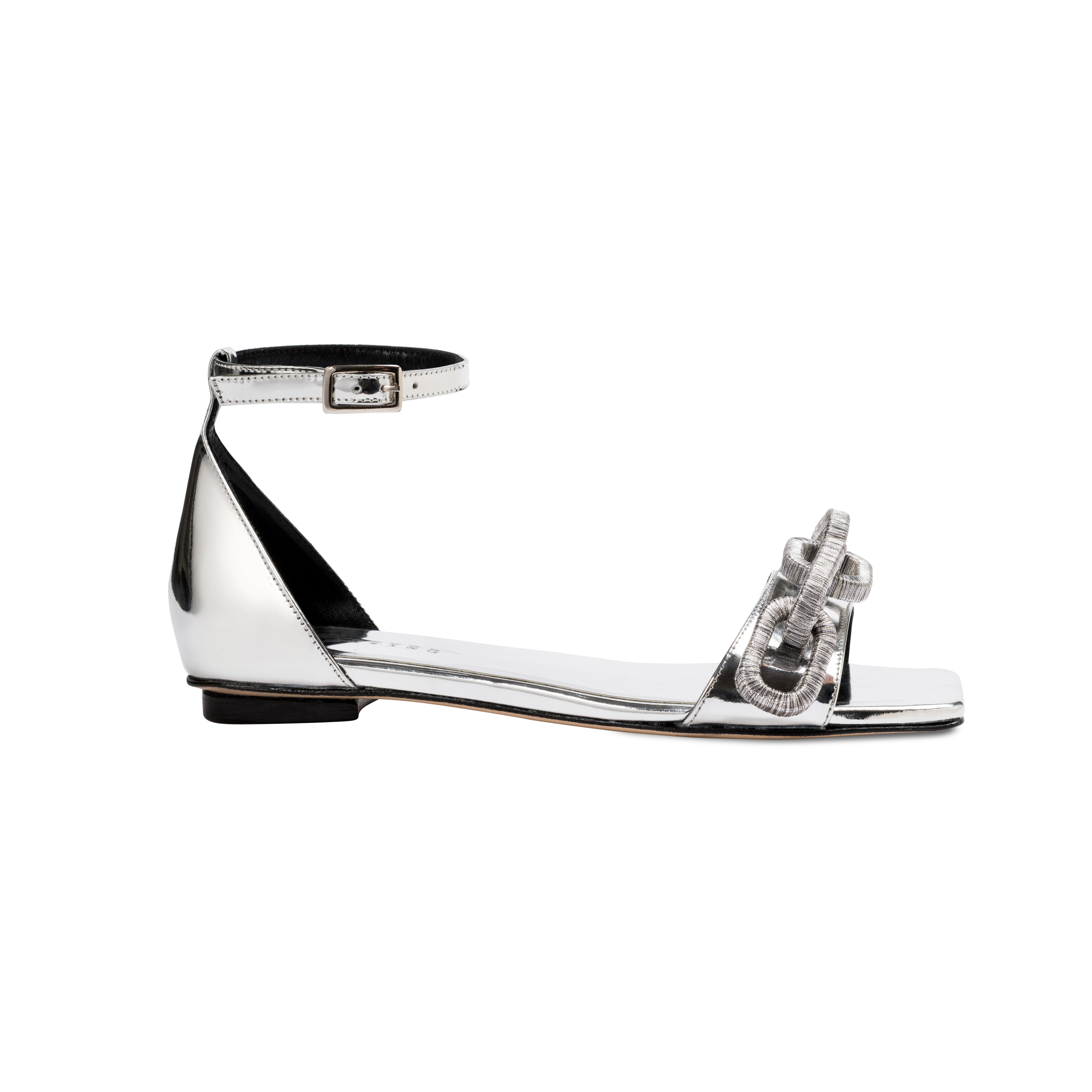 Catena mirror flat ankle sandal featuring a stylish design with metallic finish, perfect for trendy summer outfits.