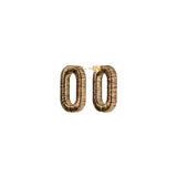 Catena One Chain Antique Gold Earring featuring intricate hand-wrapped metallic threads in a refined silhouette.