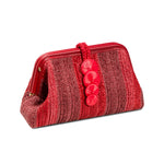 Alessa Scarlet Pouch Bag in woven red fabric with decorative buttons, perfect for stylish outings.