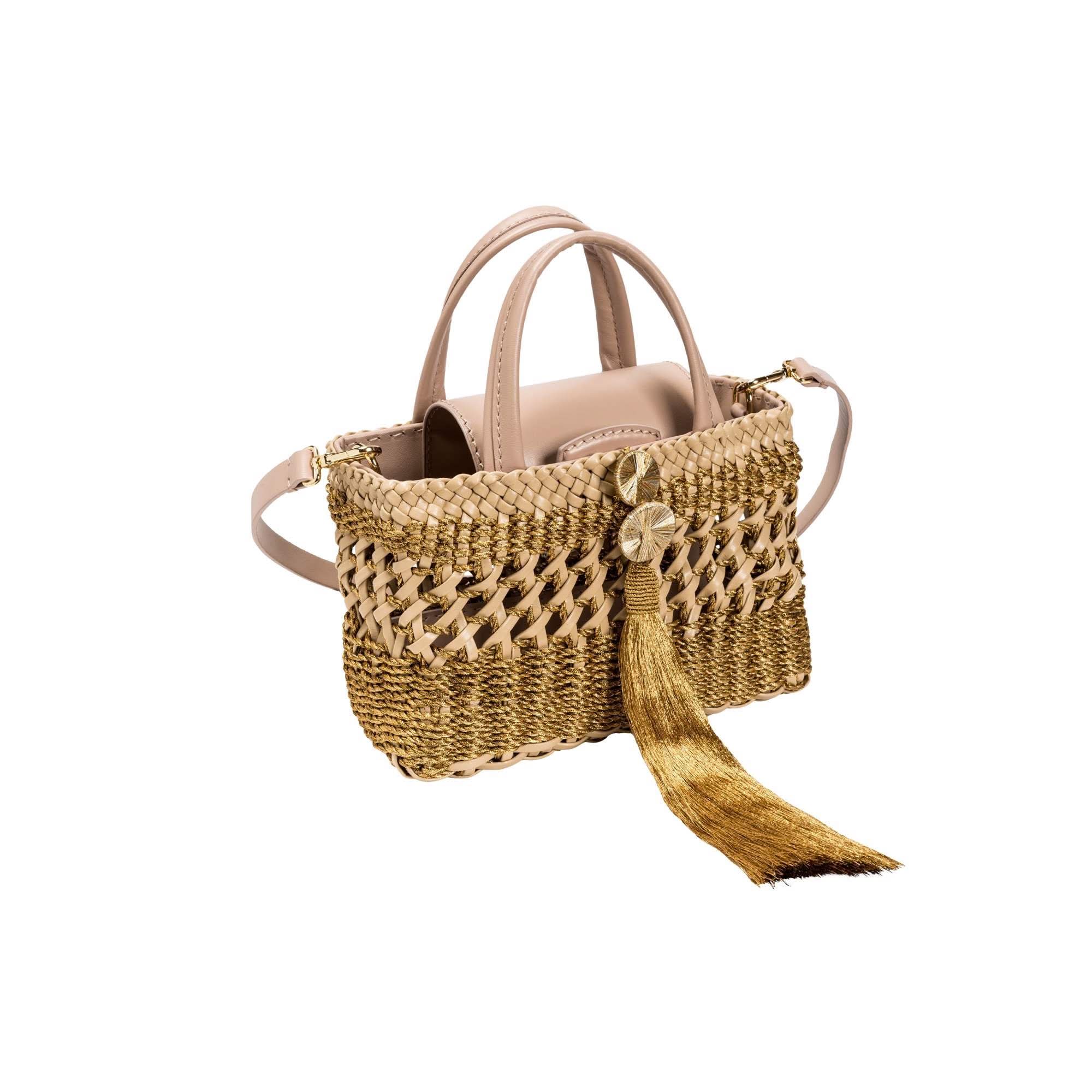 Almeria Nude Mini Tote Bag featuring leather, metallic weaving, and antique gold tassel accents.