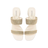 Bellina Ivory Two Strap Sandal with intricately braided straps and shimmering metallic threads, set on a 60mm block heel.