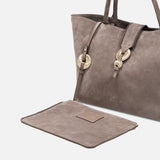 Boho Chic Medium Taupe Tote Bag featuring hand-stitched goldwork embroidery and expandable sides.