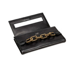Elegant black clutch with antique gold chain detail, featuring a sleek design and modern aesthetic.