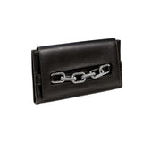 Elegant black clutch with antique silver chain detail for a sophisticated accessory look.