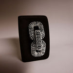 Elegant Catena Black & Glam Two Sided Clutch with intricate rhinestone detailing on a sleek black background.