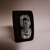 Elegant Catena Black & Glam Two Sided Clutch with intricate rhinestone detailing on a sleek black background.