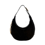 Catena Black Hobo Bag, a stylish suede bag with adjustable strap and signature chain detail, inspired by 1960s fashion.