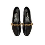 Catena black leather flat loafer with gold chain accent, perfect for stylish and comfortable everyday wear.