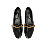 Catena black leather flat loafer with gold chain accent, perfect for stylish and comfortable everyday wear.