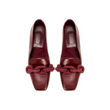 Catena Burgundy Flat Moccasin featuring suede-lined interior and elegant chain link detail, handcrafted in Italy.