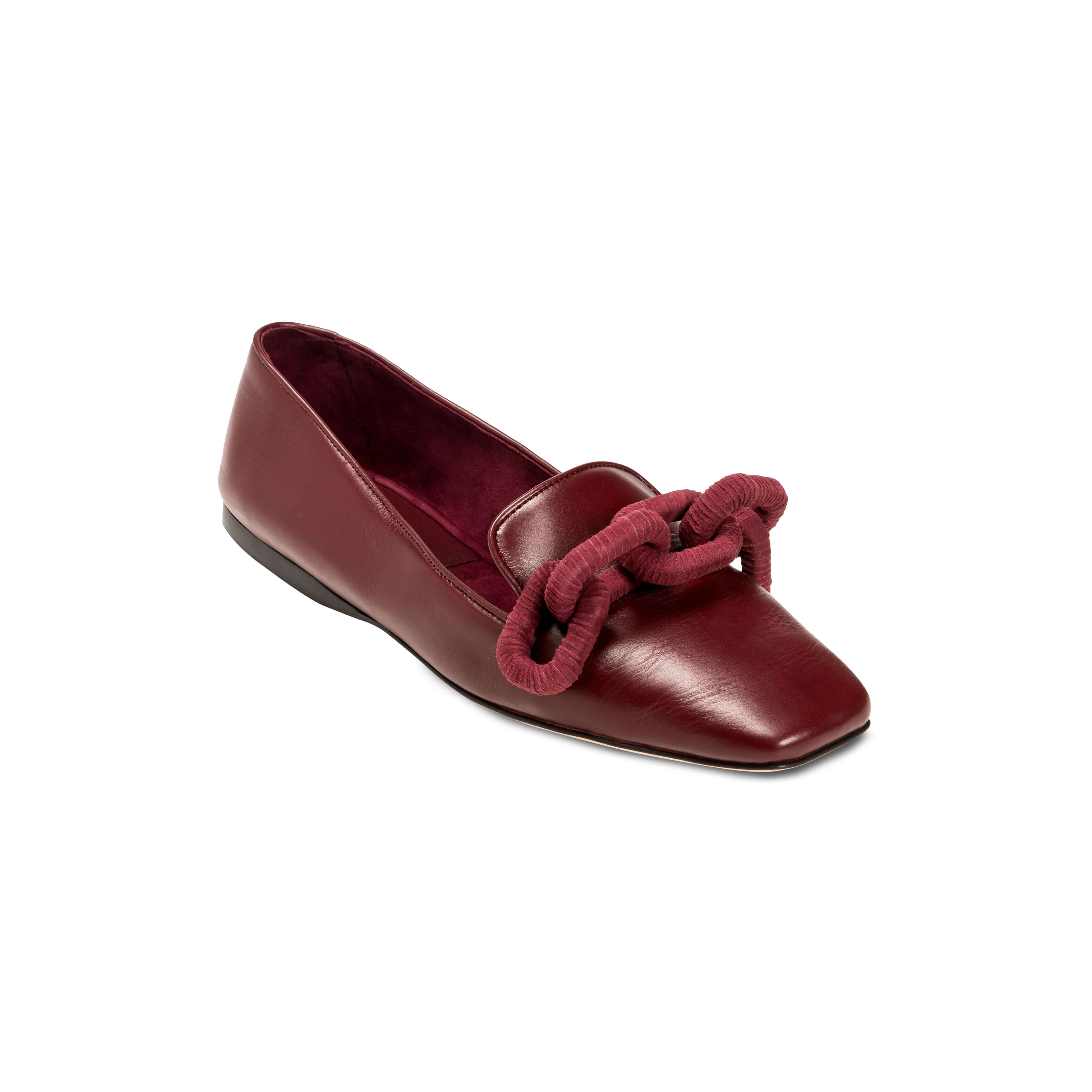 Catena Burgundy Flat Moccasin handcrafted from leather with suede lining and a stylish chain link adornment.