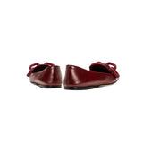 Catena Burgundy Flat Moccasin showcasing elegant back view with wrapped suede chain link detail.