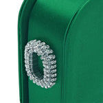 Close-up of Catena Emerald One Two Sided Clutch with crystal embellishment and luxurious green silk satin fabric.