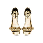 Elegant Catena gold flat ankle sandals featuring stylish straps and a sleek design, perfect for summer outings.
