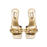 Elegant Catena Gold Mid-Heel Sandal with chain link design, crafted from fine metallic leather for a chic accessory.