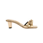 Catena Gold Mid-Heel Sandal in metallic leather with exquisite chain link design, a chic accessory for refined style.