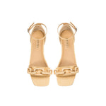 Catena Natural Flat Ankle Sandal featuring a natural raffia chain for elegance and comfort.