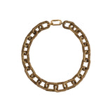 Catena Necklace in antique gold featuring a unique link design, perfect for adding elegance to any outfit.