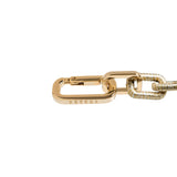 Close-up of the Catena Notte Bracelet featuring gold and silver accents, highlighting its unique clasp design.