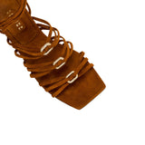 Top view of Catena Notte Camello flat lace-up sandal featuring soft suede straps and silver chains.