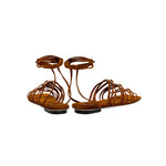 Catena Notte Camello Flat Lace-Up Sandal featuring soft suede straps and a chic gladiator design for summer adventures.