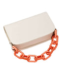 Catena Off-White & Peach two-sided bag with bold orange chain strap, ideal for stylish outings.