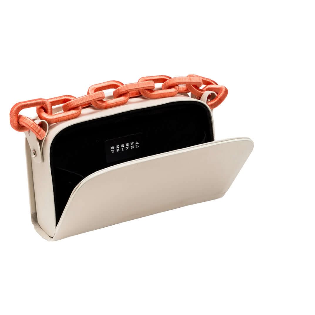 Catena Off-White & Peach Two Sided Bag with a stylish chain handle, featuring a sleek metallic finish and spacious interior.
