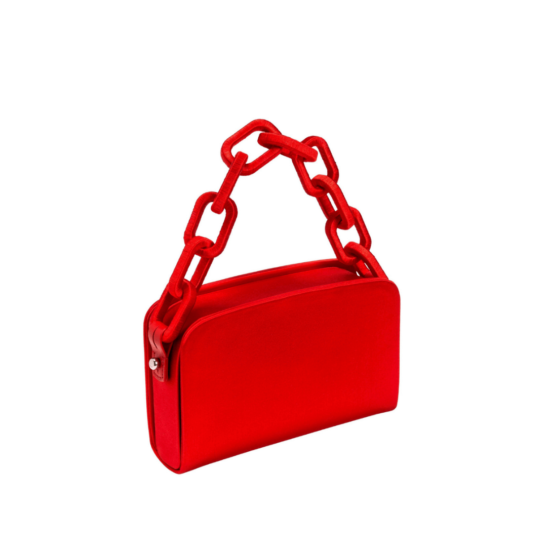 Catena Scarlet Two-Sided Bag crafted in luxurious silk satin with a striking red color and chain-link handle.