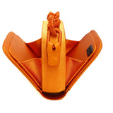 Catena Tangerine Two Sided Bag showcasing its vibrant orange color and unique folding design.