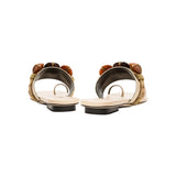 Back view of Delphine Nude Flat Toe Sandal featuring shiny earth-colored beads and a comfortable wide front strap.