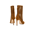 Elora Camello High-Heel Ankle Boot showcasing suede caging with metallic detailing and a chic design, perfect for stylish outings.