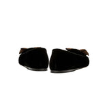 Fiocco Black Velvet Flat Moccasins featuring antique gold embroidered bow, showcasing luxurious craftsmanship and chic design.
