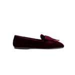 Elegant burgundy flat moccasin with metallic embroidered bow, crafted for comfort and style.