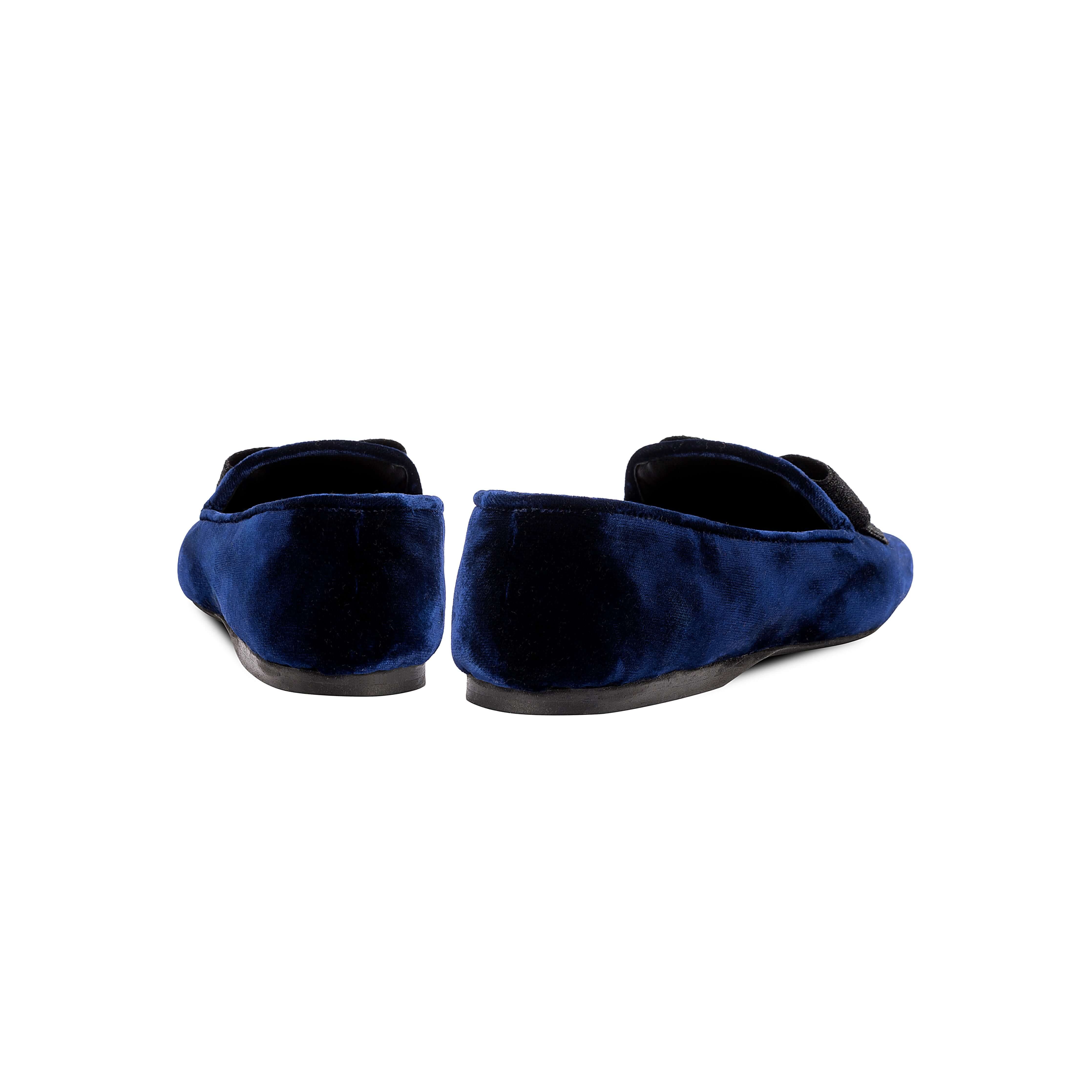 Back view of Fiocco Navy Flat Moccasins, showcasing luxurious navy velvet fabric and elegant bow detail.