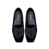 Fiocco Navy Flat Moccasin featuring elegant black embroidered bow on luxurious navy velvet, perfect for chic fall style.