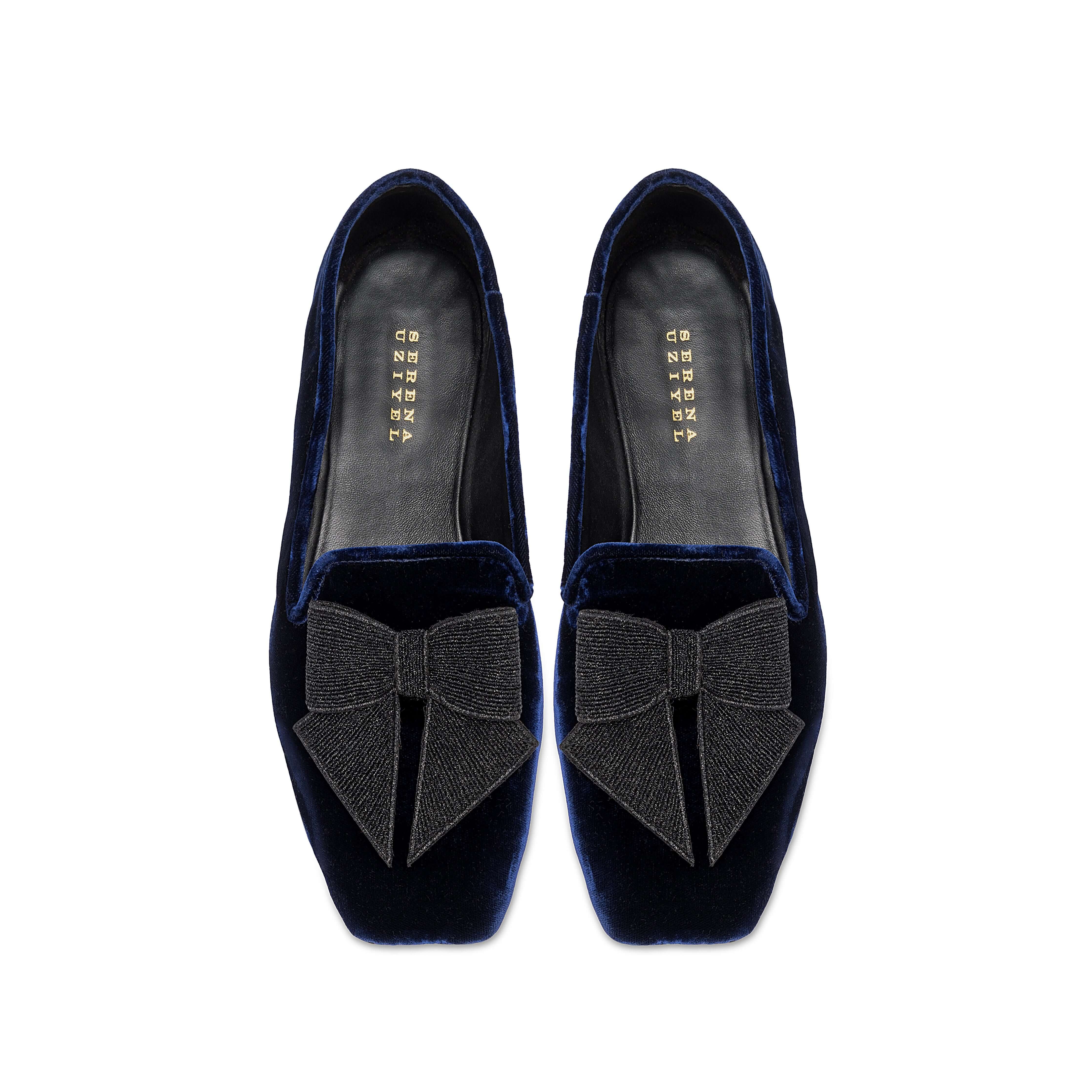 Fiocco Navy Flat Moccasin featuring elegant black embroidered bow on luxurious navy velvet, perfect for chic fall style.