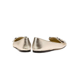 Back view of Fiocco Sahara Flat Moccasin in metallic leather with decorative bow, showcasing chic Fall footwear.