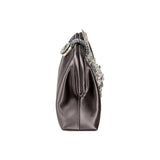 Side view of the Fiora Electrum Pouch Bag, showcasing its elegant silver flower embellishment on a satin finish.