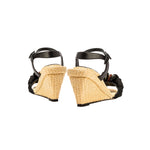 Melita Natural Wedge Ankle Sandal featuring a raffia design and black rope details on a stylish wedge heel.