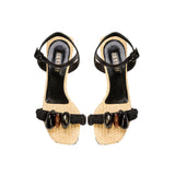 Melita Natural Wedge Ankle Sandal with raffia, stone accents, and black rope straps for stylish summer comfort.