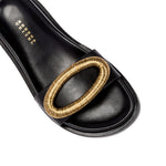 Naria Black Comfort Slide featuring a stylish gold ring detail, perfect for elegant daily wear.