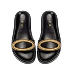 Naria Black Comfort Slide featuring a stylish golden accent on a sleek black design for ultimate comfort and elegance.
