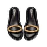 Naria Black Comfort Slide featuring a stylish golden accent on a sleek black design for ultimate comfort and elegance.