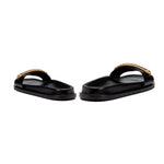 Naria Black Comfort Slide sandals with a stylish gold strap, offering casual elegance and comfort.