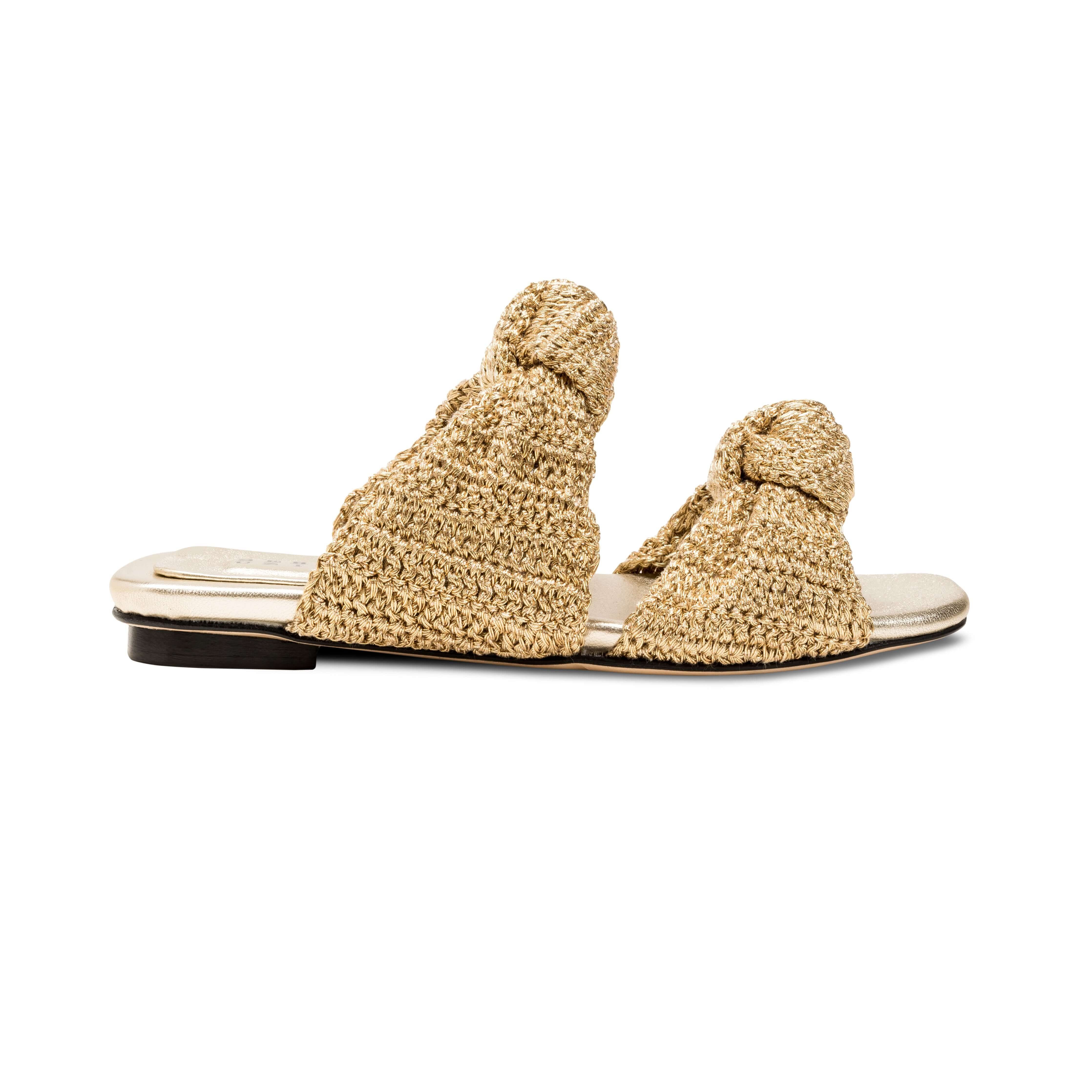 Rhea Mekong 2 Knot Sandal featuring knotted crochet leather straps in Mekong gold, showcasing artisanal craftsmanship.